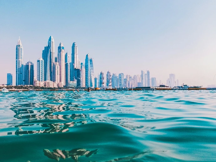 city skyline under blue sky during daytime